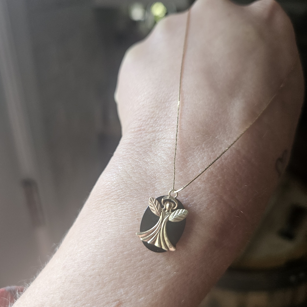 Elegant Gold and Black Angel Pendant Necklace
